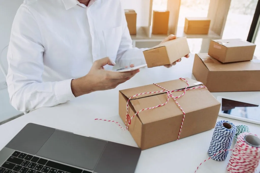 Asian Young Man Using Smart Phone For Checking Shipment Order At Home 1024X682 1 | RODRIGUEZ GARCIA ALBERTO JOSE